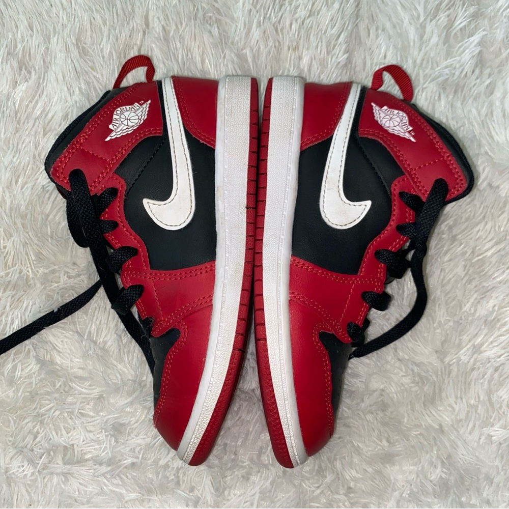 Kids Red and Black Nike Sneakers